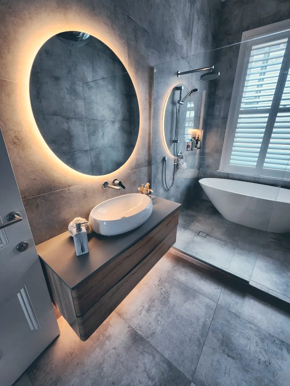 Backlit LED mirror installation in modern bathroom - Westside Electrical
